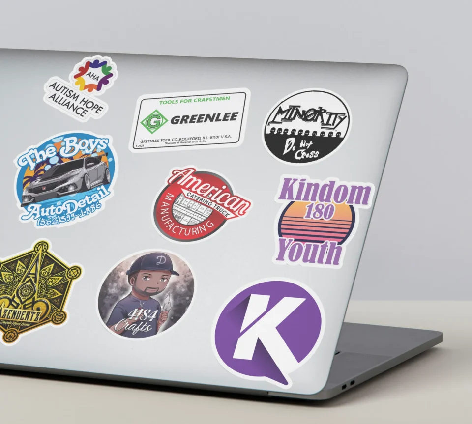A laptop covered with colorful custom-cut vinyl stickers